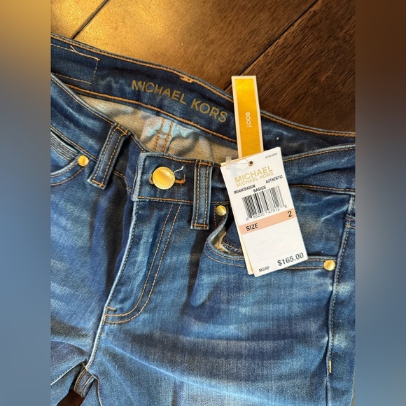 Michael Kors Medium Wash Faded Denim Low-Rise Flared Jean - Picture 4 of 6